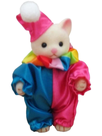 A Frankie Stein doll in her classic outfit, she is looking at the viewer with one hand on her hip and holding the other out to hold her bag.